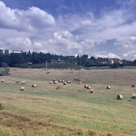 Italy Landscape with Many Hay Bales, Vintage Style Toned Pictureの写真素材