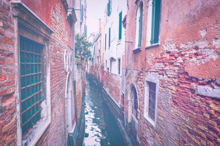 Deserted Venice in faded color effect. Museum City is situated across a group of islands that are separated by canals and linked by empty bridges.の写真素材