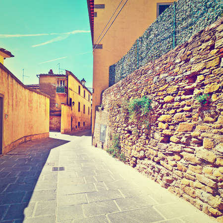 Narrow Alley with Old Buildings in Italian City, Instagram Effectの写真素材