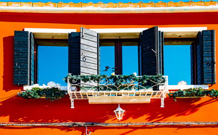 Italian culture on Venetian facades. Venice is rich and poor, well-groomed and abandoned, reflected...
