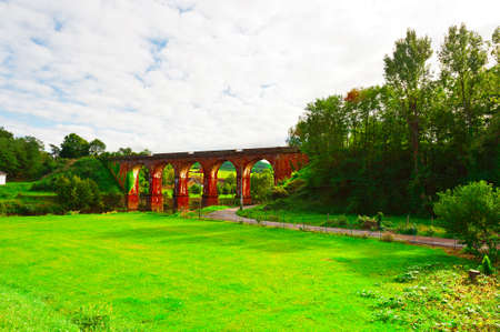 Old Stone Bridge over the River in the French Alpsの写真素材
