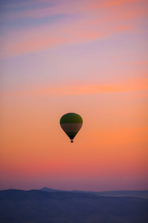 Bright hot air balloons in sky of Cappadocia, Turkeyの写真素材