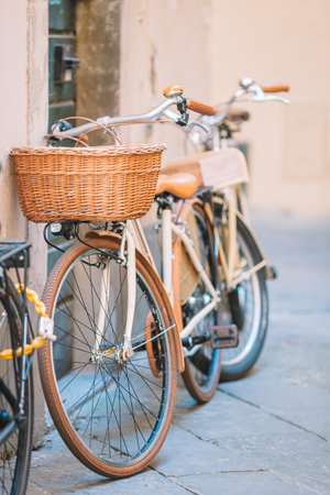 Beautiful vintage bicycle near the house on italian streetの写真素材