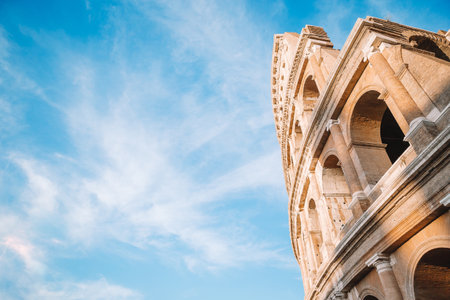 Colosseum or Coliseum background blue sky in Romeの写真素材
