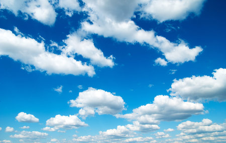 Blue sky background with a tiny clouds
