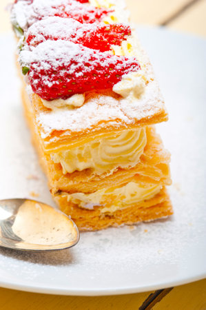 fresh baked napoleon strawberry and cream cake dessertの写真素材