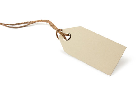 Blank price or address tag with natural ribbon twine, isolated on whiteの写真素材