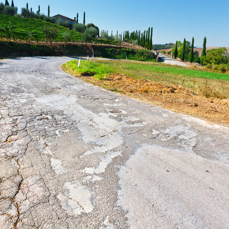 Winding Paved Road in the Tuscany, Italyの写真素材