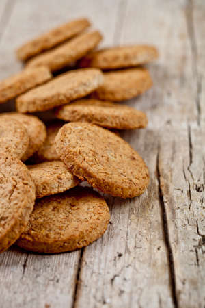 Fresh oat cookies on rustic wooden table background. With copy space.の写真素材