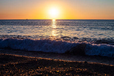 Red sunset over the sea. Beautiful sunset. Tyrrhenian Sea sunset in Calabria, Italy.の写真素材