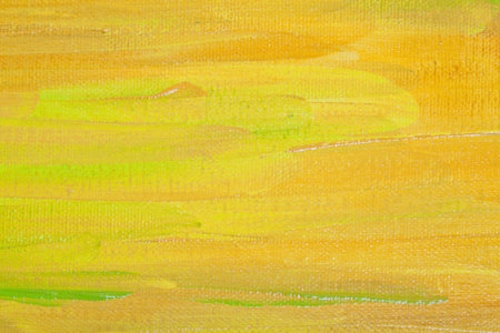 Yellow and green colored wall texture background. Decorative wall paint.の写真素材