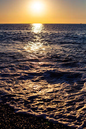 Red sunset over the sea. Beautiful sunset. Tyrrhenian Sea sunset in Calabria, Italy.の写真素材