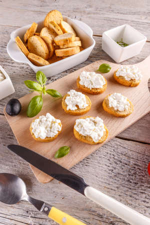 Fresh cottage cheese with whole wheat rolls for breakfastの写真素材