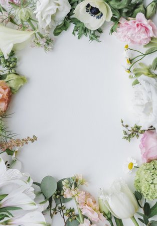 Fresh flowers frame on a white backgroundの素材
