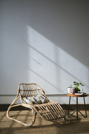 Wicker seat by a windowの素材
