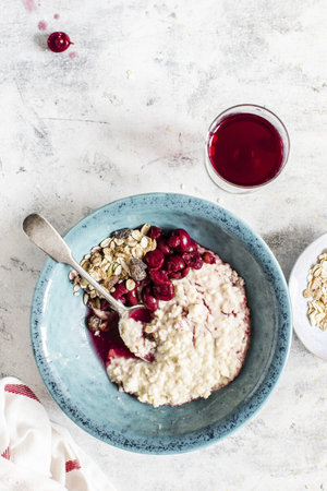 Cherry porridge in a bowlの素材