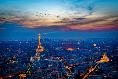 Eiffel Tower and Paris cityscape at nightの素材