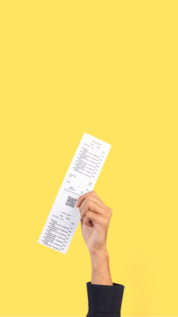 Hand holding receipt for shopping campaignの素材