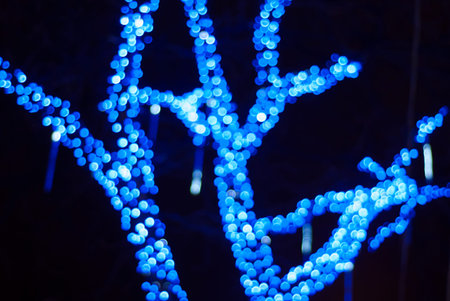 blurred image of light rays on the streets of the city at nightの写真素材