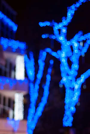 blurred image of light rays on the streets of the city at nightの写真素材