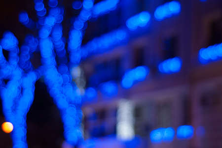 blurred image of light rays on the streets of the city at nightの写真素材