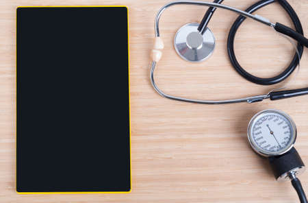 background tablet on the table and medicinesの写真素材