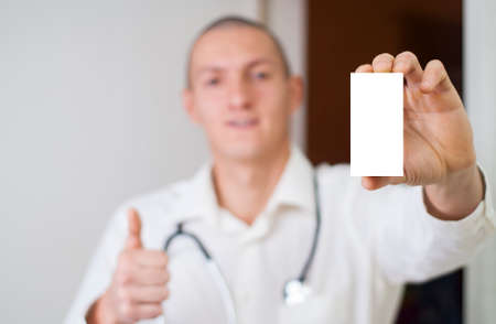 young doctor showing that holds good medicineの写真素材