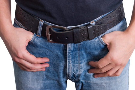man dressed in jeans with a black belt