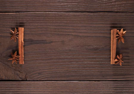 star anise and cinnamon on a wooden backgroundの写真素材