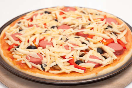 appetizing freshly baked pizza on the tableの写真素材