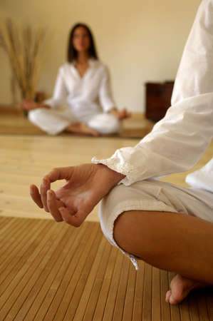 Young women in yoga positionの写真素材