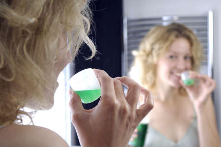 woman and mouthwashの写真素材