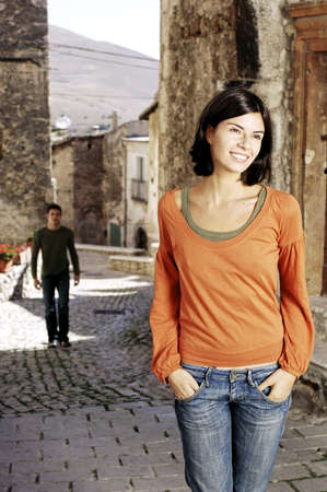 woman standing and smilingの写真素材