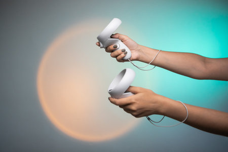 hands holds vr remote controller, Wireless joystick for next generation video games and consoles