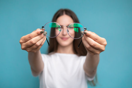 Beautiful smiling woman wearing glassesの写真素材