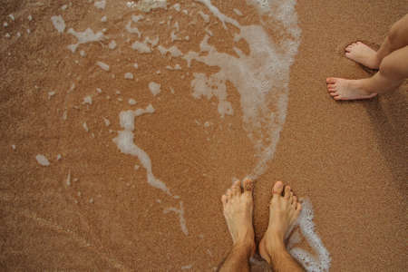 legs of child on the sand beach red sea nice tropical viewの写真素材