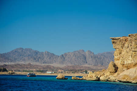 blue sky blue sea mountain in sea nice background sandの写真素材