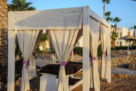 massage table in red sea beach tropical location sand hotelの写真素材