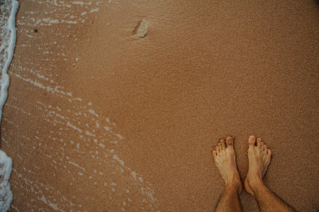 legs of child on the sand beach red sea nice tropical view