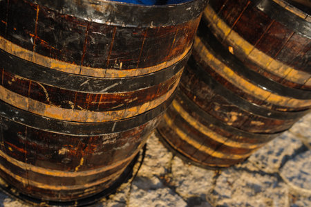 wood old wine barrel with steel ring background