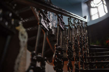 Antique old vintage stairs in old house darkの写真素材