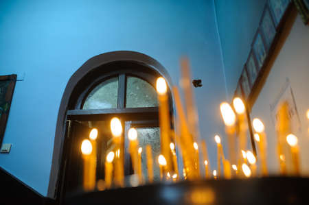 White Candle Dark Background wood windowの写真素材