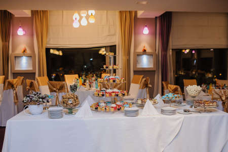 candy bar composition of sweets: cupcakes, cookies, and fruitsの写真素材