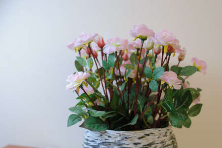 Artificial flowers of pink Roses for decoration, beautiful plastic bouquetの写真素材