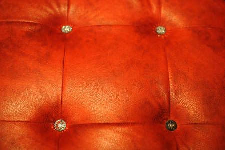 Red leather background with diamond buttons luxury vintage textureの写真素材