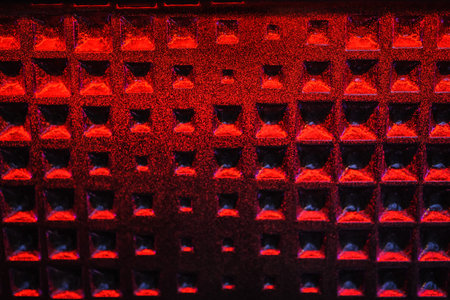 background of metal red wall with square textureの写真素材