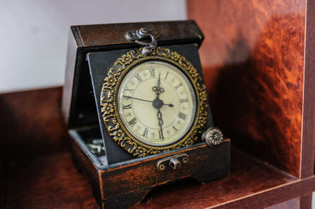 Antique old vintage wooden wall clock. Interesting viewの写真素材