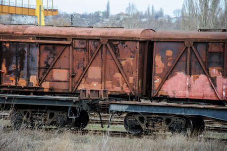Abandoned rusty railway containers for as and oil transportation. Abstract train transport. Vintage style.の写真素材