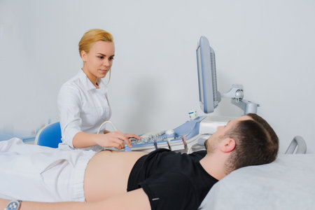 Smiling female doctor ultrasound examine a patient abdomen at the hospital. USG 