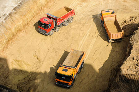truck working hard at the contruction site の写真素材